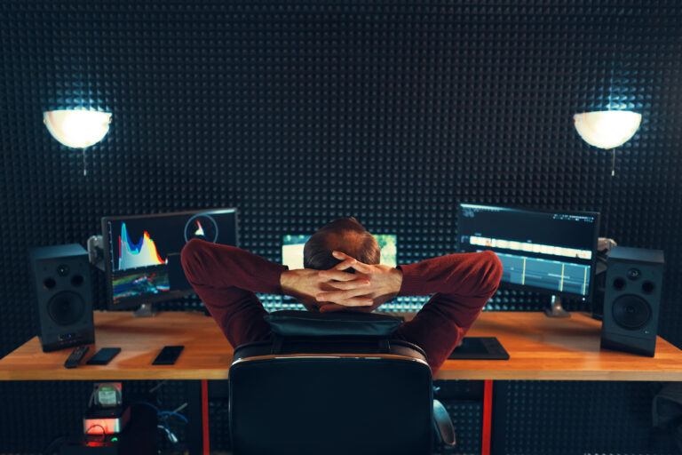 🚀 Tasks Every Startup Should Outsource Immediately A focused person wearing a headset, diligently managing an online calendar and tasks as a remote virtual assistant.