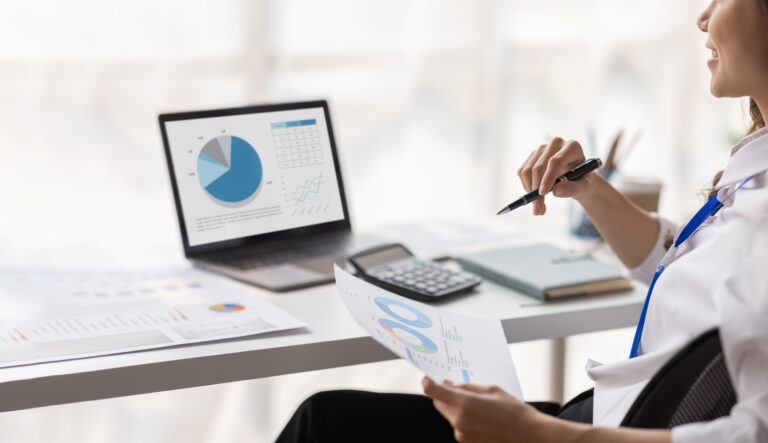Outsourcing vs. Hiring In-House: Which Wins for Your Business? close up of businesswoman accounting using calcula 2025 02 21 04 07 21 utc